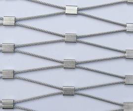 Wire rope woven mesh with ferrules